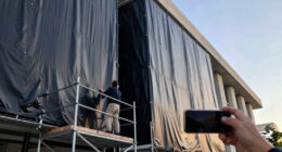 Judge asks the Kennedy Center to explain tarps covering the building